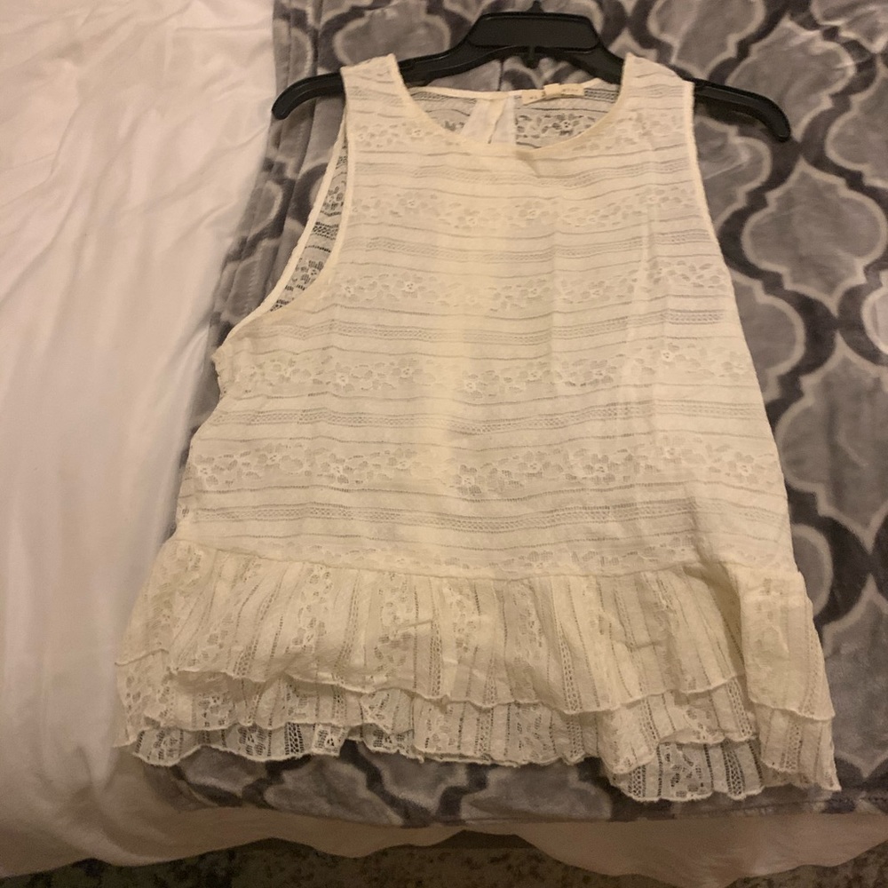 White ruffled blouse